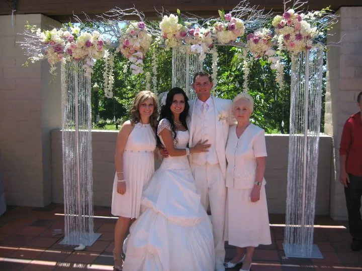 Futuristic roller coaster inside a vibrant, neon-lit indoor amusement park.