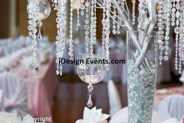 Futuristic roller coaster inside a vibrant, neon-lit indoor amusement park.