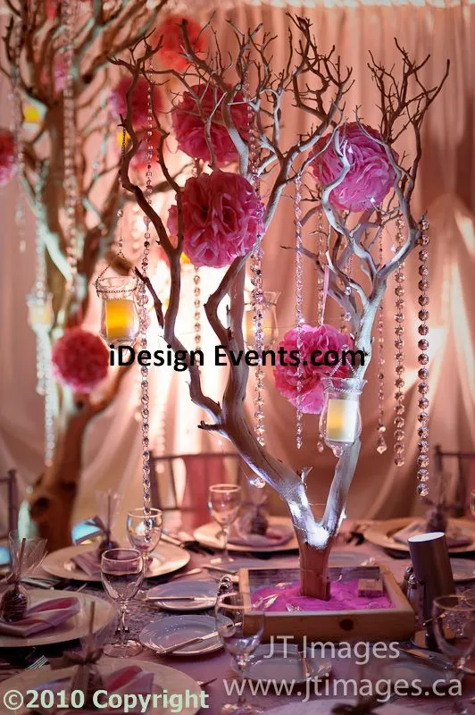 Futuristic roller coaster inside a vibrant, neon-lit indoor amusement park.