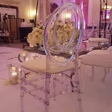 Futuristic roller coaster inside a vibrant, neon-lit indoor amusement park.