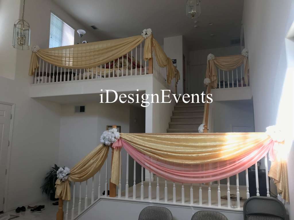 Futuristic roller coaster inside a vibrant, neon-lit indoor amusement park.