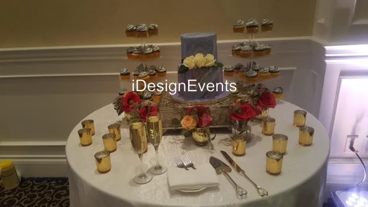 Futuristic roller coaster inside a vibrant, neon-lit indoor amusement park.